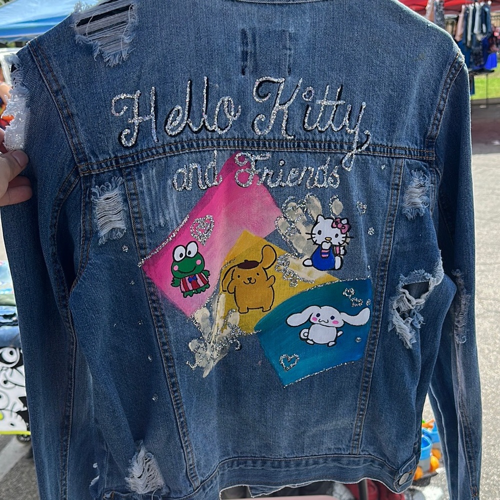 Almost Famous Blue and Pink Jean Jacket with Playful Design